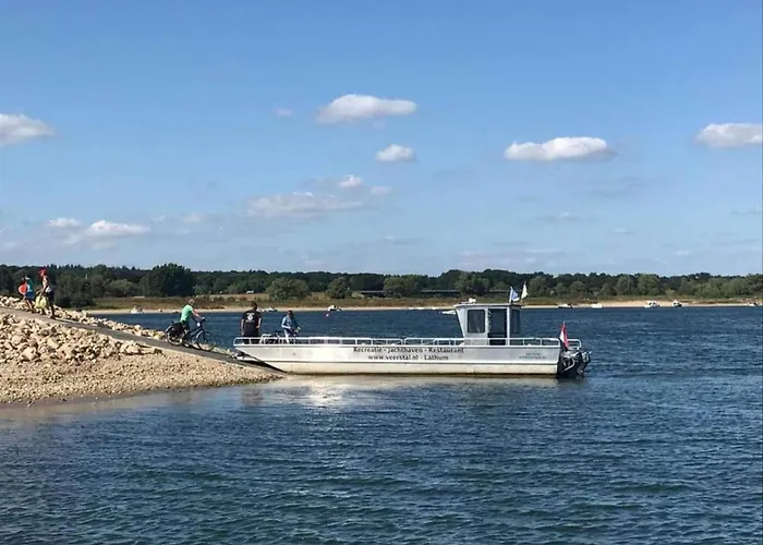 Botel Houseboat In Lathumse Plas With Harbor Views Lathum